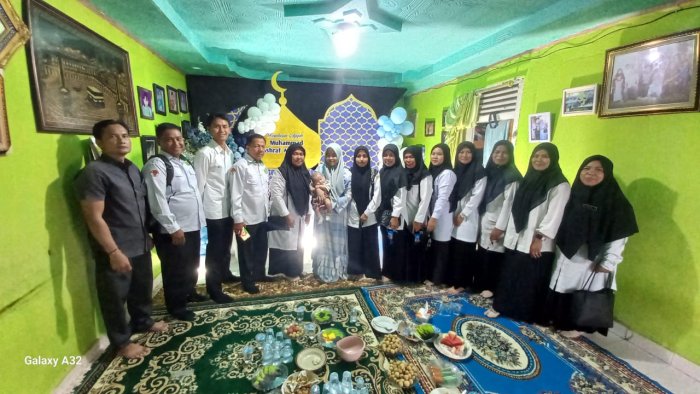 MAN 2 Bungo Hadiri Tasyakuran Aqiqah Ponaan Salah Satu Guru