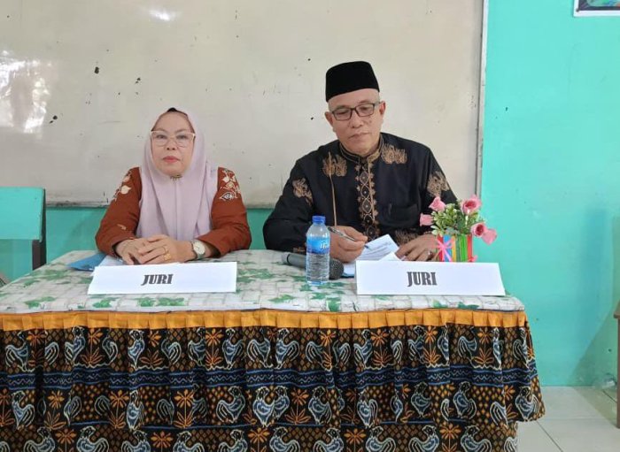Bapak H. Mahyudin, M.Pd.I dan Ibu Hj. Nurhadisma, S.Ag Jadi Juri Lomba Sholat Jenazah MAN 2 Bungo Semarakkan Isra Mi'raj Nabi Muhammad SAW